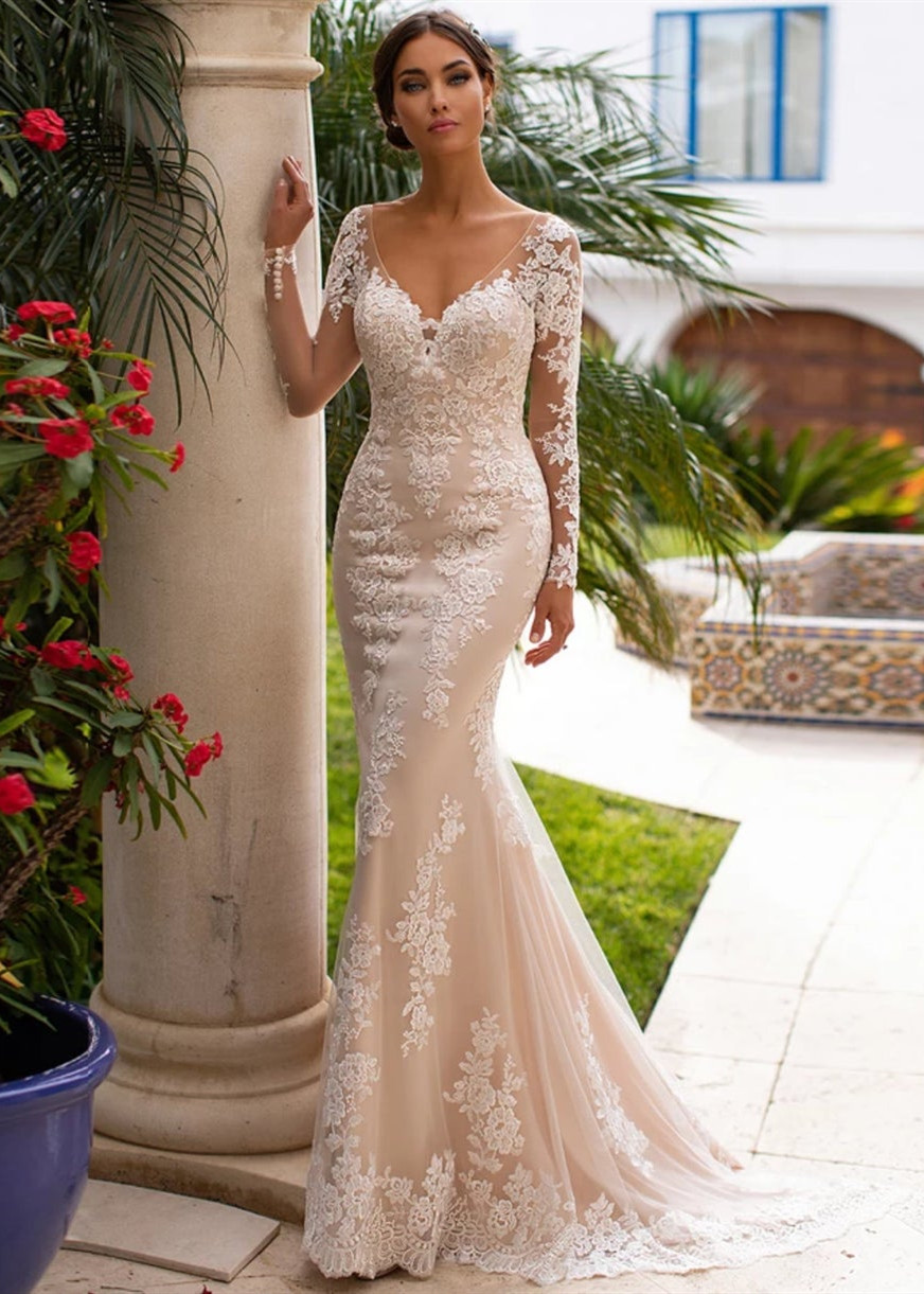 Ivory lace over store champagne wedding dress